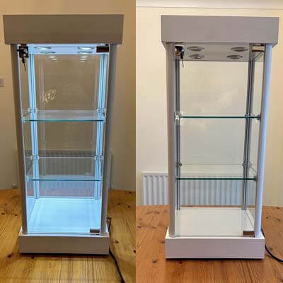 Two countertop glass display cabinets with locking doors & 4 daylight LED lights